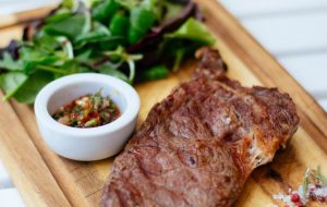 shallow-focus-photography-of-meat-dish-and-leaves-1251208
